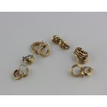 Four pairs of gold hoop earrings and a single earring, all detailed '750', gross weight 12.6g,