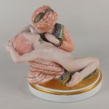A Royal Copenhagen porcelain figure group 'Fairy Tale III' designed by Gerhard Henning, oval base