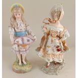 A Dresden type porcelain figure of a lady wearing a cream floral dress and matching bonnet, with