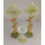 A pair of Victorian vaseline glass trumpet vases, with trailing pink frilled decoration 31cm high,