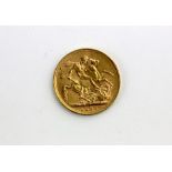 A Victorian gold sovereign dated 1892