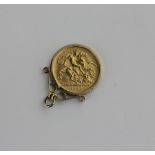 A George V gold half sovereign dated 1912 in 9ct gold loose pendant mount