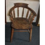 A Captain's open bow elbow chair with turned supports, solid seat on plain sloping legs