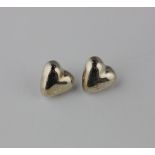 A pair of silver heart shaped stud earrings, detailed 'Tiffany & Co 925 Mexico'