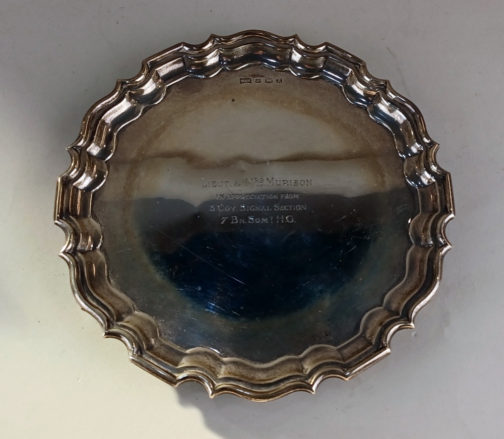 A George VI silver card tray with pie crust border and presentation inscription, maker Walker and