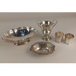 A George V silver oval pedestal dish with pierced border, pair of silver tots, pierced oval bonbon