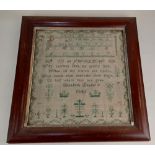 An early Victorian needlework sampler by Elizabeth Loader 1845, with alphabet and religious verse '