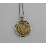 A Queen Victoria gold sovereign in gilt metal pendant mount and chain