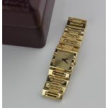 A lady's 18ct gold Piaget quartz bracelet watch, with a rectangular dial, raised gold dot batons and