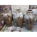 Three composite garden four-handled amphora 82cm high