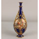 A Royal Crown Derby porcelain vase, decorated with Art Nouveau style peach trees and gilt