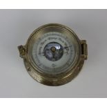 A brass bulkhead style wall barometer dial marked BariGo 12cm