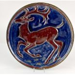 A Pilkington's Royal Lancastrian lustre plate by Richard Joyce (1873-1931), modelled in light relief