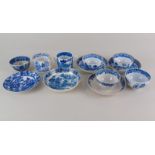 A collection of Royal Worcester and similar willow pattern coffee cans and tea bowls, with