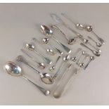 A collection of various silver cruet and serving spoons including a butter knife, pair of sugar