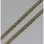 LLOT WITHDRAWN A pierced chain necklace, marked '18K', length 60cm, gross weight 42g