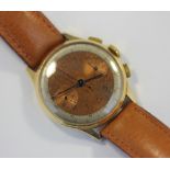 A 1940s gentleman's 18ct gold chronograph wristwatch with two-tone dial on leather strap