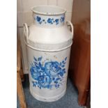 A United Dairies Wholesale Ltd 10 gallon milk churn, painted with blue floral decoration on white