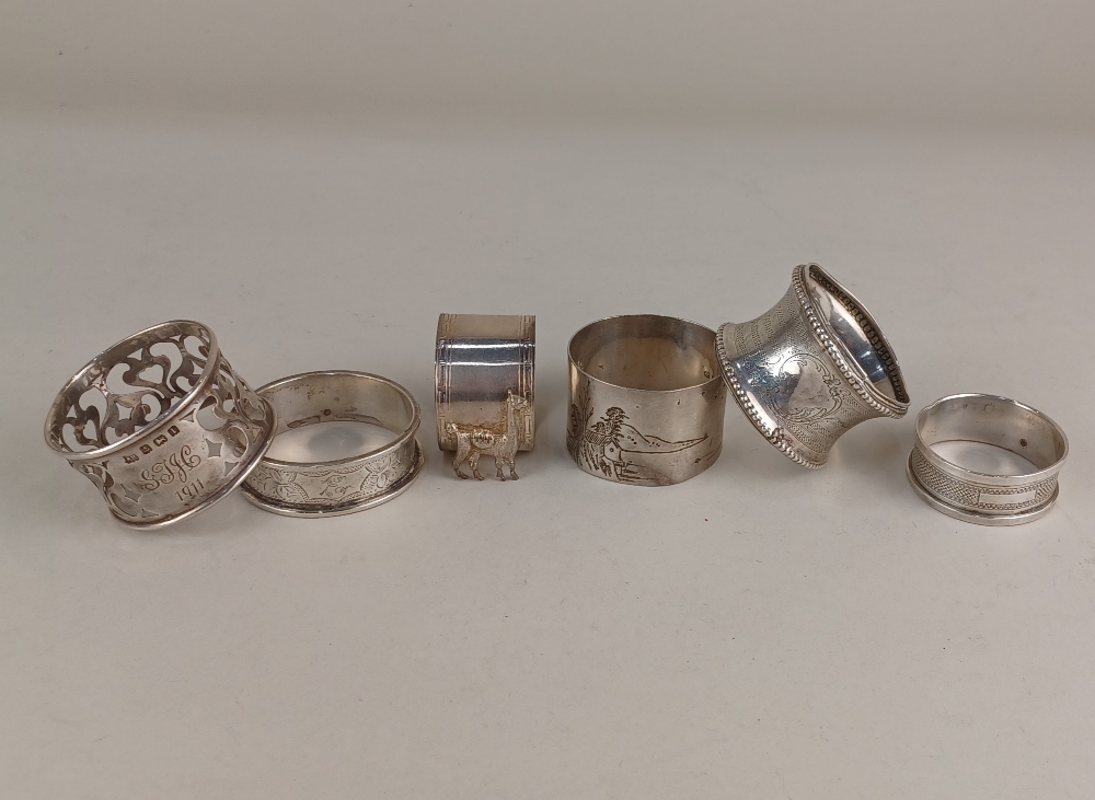 Three silver serviette rings and three foreign siver napkin rings (a/f) wt.3oz