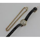 A 9ct gold chain link bracelet 6.5g, together with a lady's Tissot wristwatch (marks rubbed)