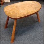 A rustic oak occasional table on three splayed legs length 69cm, height 50cm