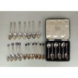 A cased set of six George VI silver coffee spoons Birmingham 1939, seven George V silver coffee