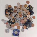 A collection of British and international coinage, some silver, to include commemorative crowns