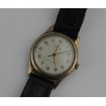 A Rolex gold circular cased gentleman's wristwatch the signed silvered dial with gilt Arabic