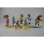 Seven Royal Doulton 'Bunnykins' figures comprising Aussie Surfer, Tourist, Seaside, Sydney,