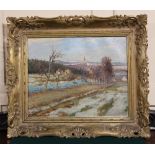 20th century school, winter view of a distant town, oil on canvas, indistinctly signed Zah*?, 38cm