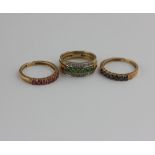 An 18ct gold and diamond and gemstone triple function ring comprising three interchangeable half