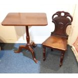 A Victorian hall chair with scroll framed back and solid seat and a George III rectangular tripod