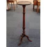 A mahogany jardiniere stand baluster column stem and tripod base, height 108cm