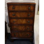 A reproduction mahogany narrow chest of five drawers with drop ring handles on bracket feet (a/f)
