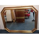 A gilt framed wall mirror with cut corner rectangular frame. width 116cm height 90cm