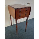 A Victorian mahogany small Pembroke type side table with two drop flaps and two drawers, on turned