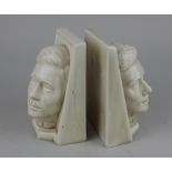 A pair of cream glazed bookends each modelled with a bust of Edward VIII by Felix Weiss 1937 15cm