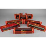 Eleven various Hornby Railways model railway coaches, boxed, together with a small collection of