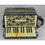 A Barcarole piano accordion with blue pearlescent finish, cased