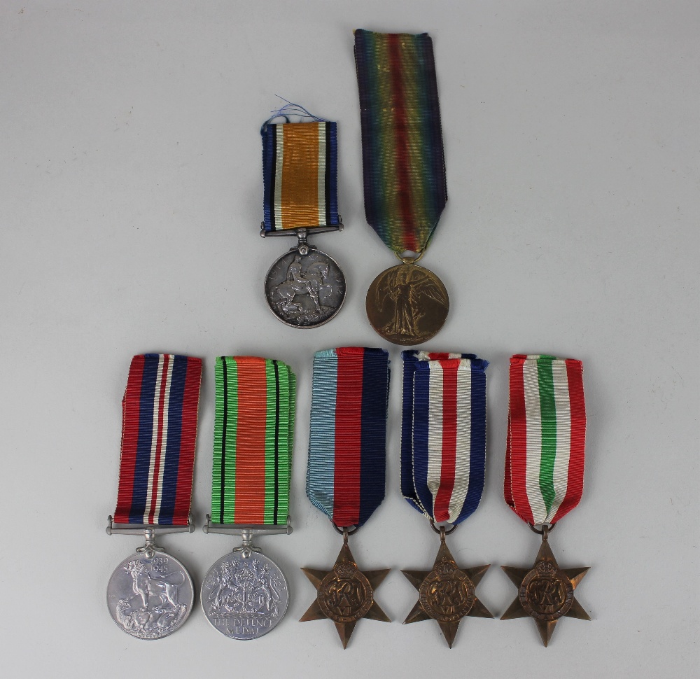 A family group of First and Second World War medals, comprising a First World War War and Victory