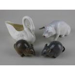 A Royal Copenhagen porcelain pig 14cm, a pair of mice, 7cm and Belleek porcelain swan, 11cm