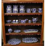 A collection of Burleigh Calico tea, coffee and tableware, comprising two tea canisters, a coffee