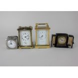 Two brass cased carriage clocks, one Mappin and Webb, both with keys, together with two travel