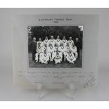 A signed photograph of the 1938 Australian Cricket Team 37cm by 44cm including signed mount,