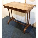 A Victorian rosewood side table rectangular top on turned supports and down swept feet and