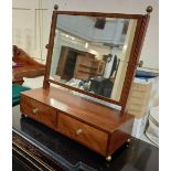 A George III mahogany dressing table mirror with adjustable rectangular mirror on box base with