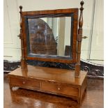 A George III mahogany dressing table mirror adjustable rectangular frame on turned supports and