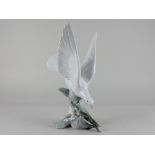 A Lladro porcelain model of a bird, no 4550 Tortola, 29cm high