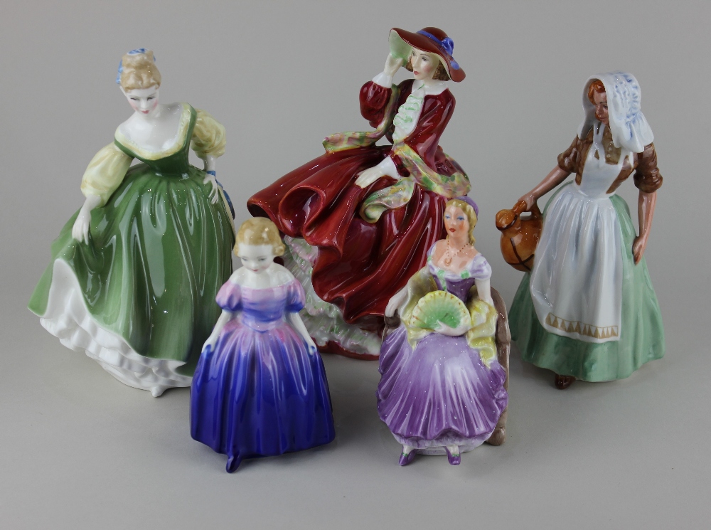 Four Royal Doulton figures of ladies comprising Top o' the Hill 20cm, The Milkmaid 17cm, Fair Lady