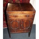 A George III converted washstand with rising top, cupboard and drawer on square legs (a/f) 51cm